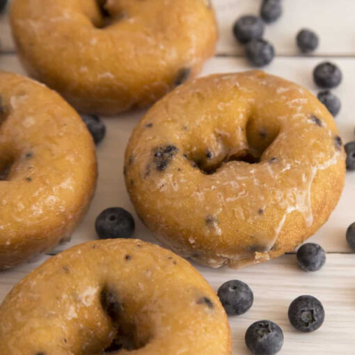 homemade blueberry donuts on counter